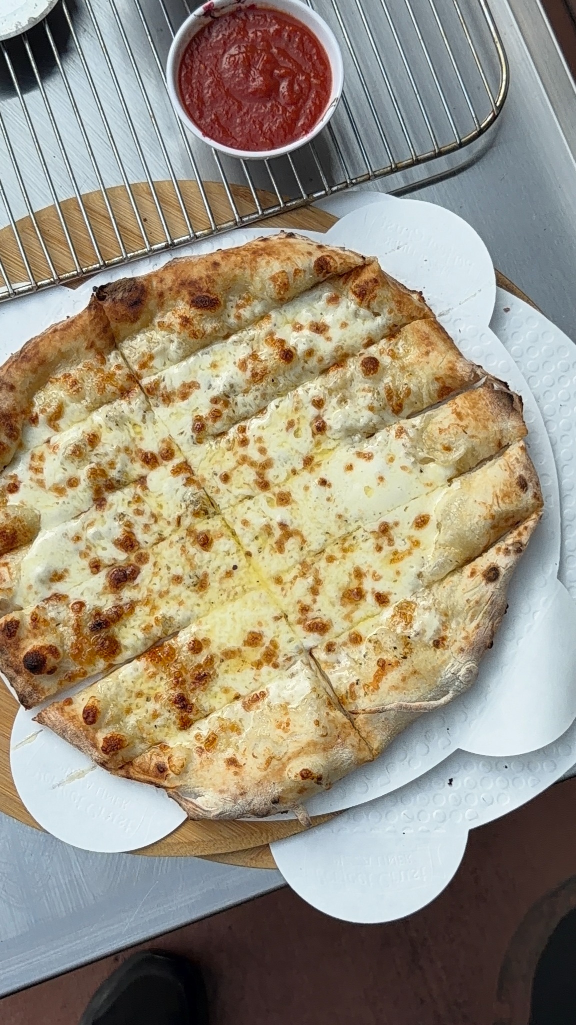Ray Sierengowski's cheese pizza on a Perfect Crust Pizza Liner
